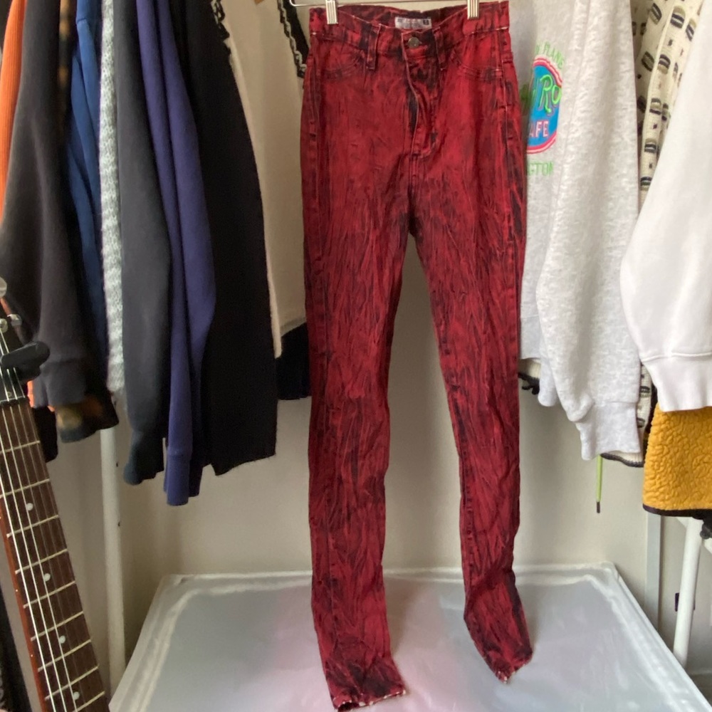 Red acid wash skinny jeans
